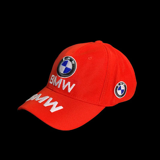 Red cap with BMW logo on a black background