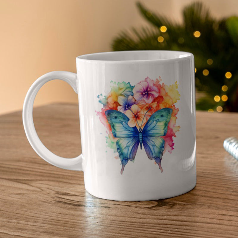 A white ceramic mug with a colorful butterfly and floral graphic print.