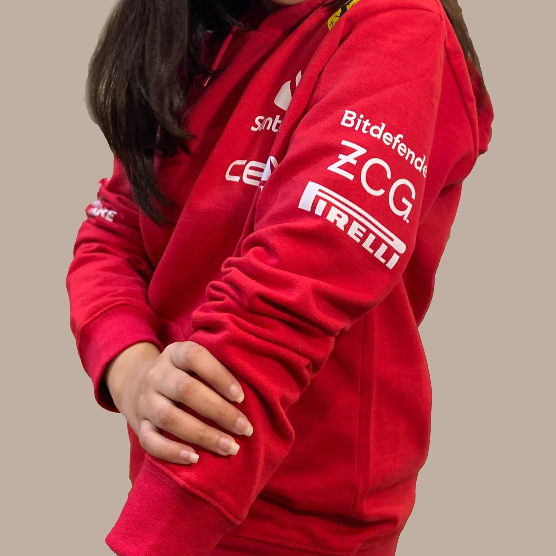 Authentic Ferrari Formula 1 team sweatshirt with embroidered logos and comfortable fit.