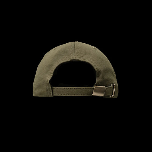 The back view of an olive green baseball cap with an adjustable fabric strap and a silver metal slider buckle, shown against a solid black background.