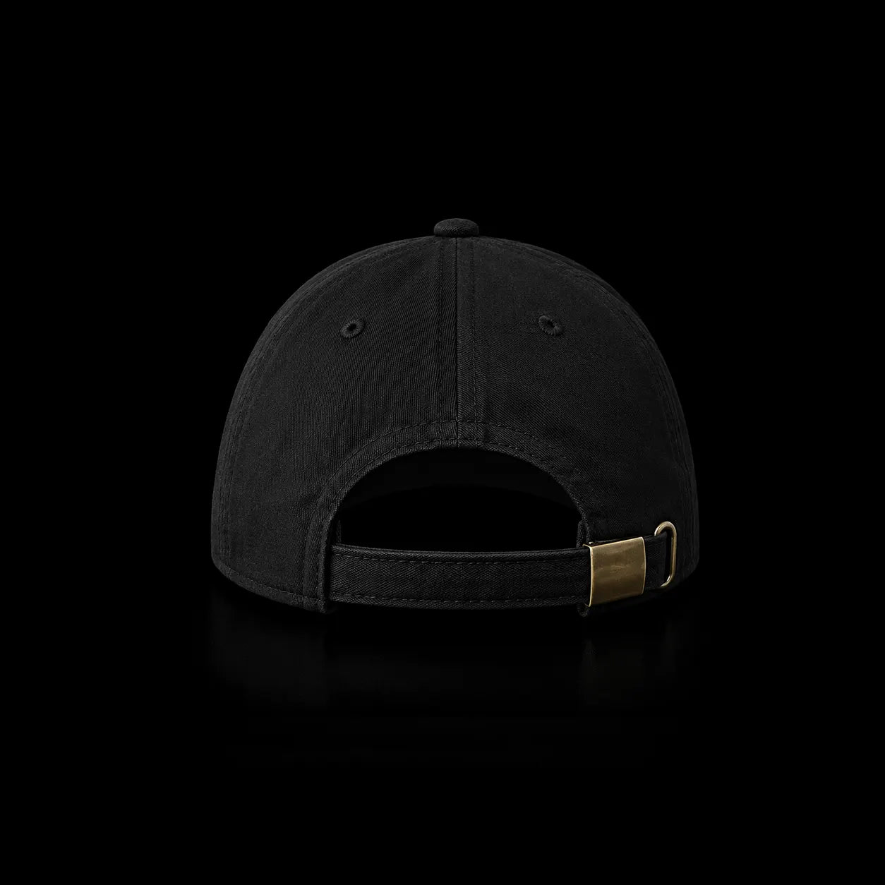 The back view of a black baseball cap with an adjustable strap and a gold-tone metal slider, shown against a solid black background.