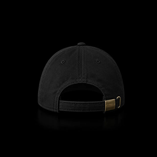 The back of a black cotton baseball cap with an adjustable strap and a gold metal buckle, shown against a solid black background.