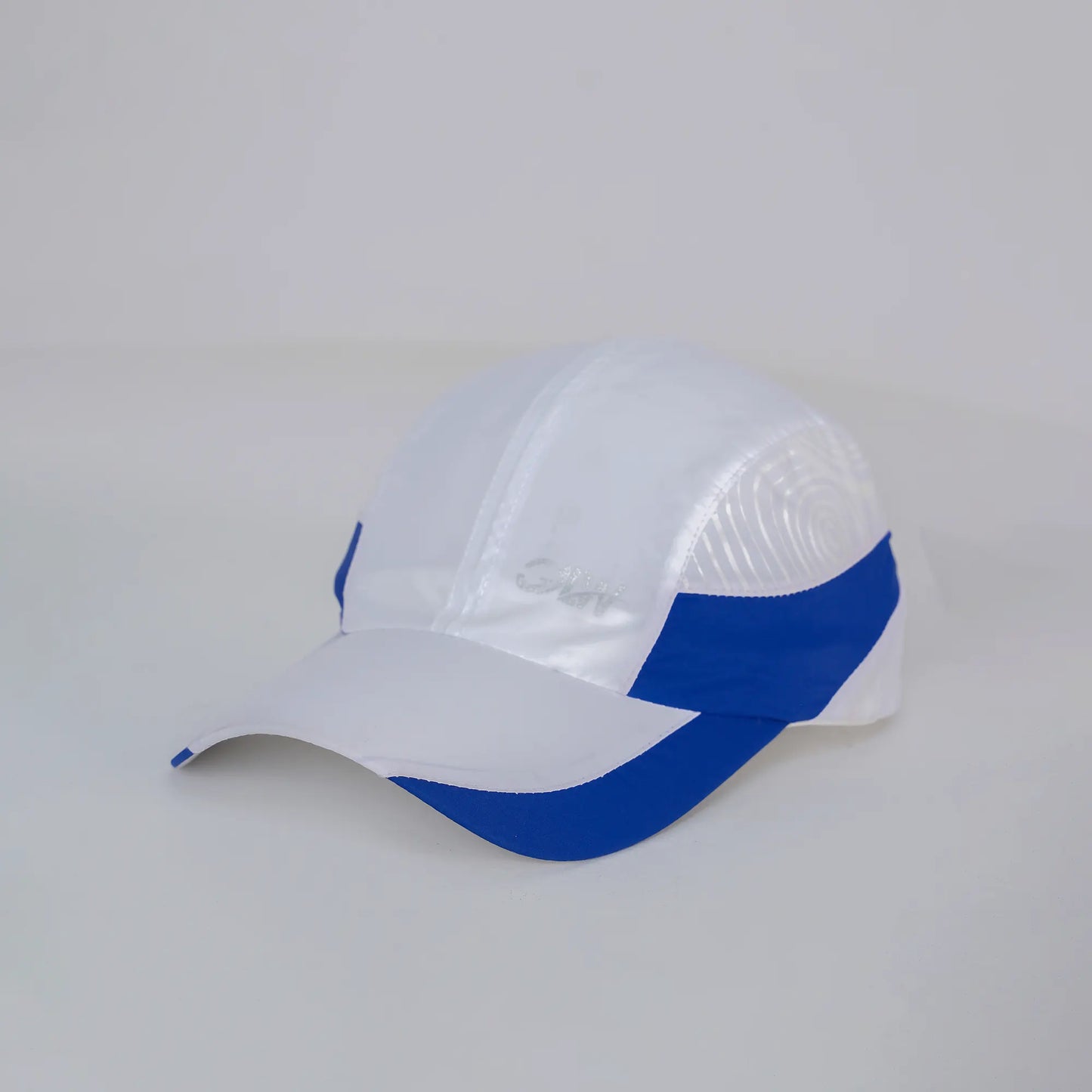 White and blue cap on a light gray background