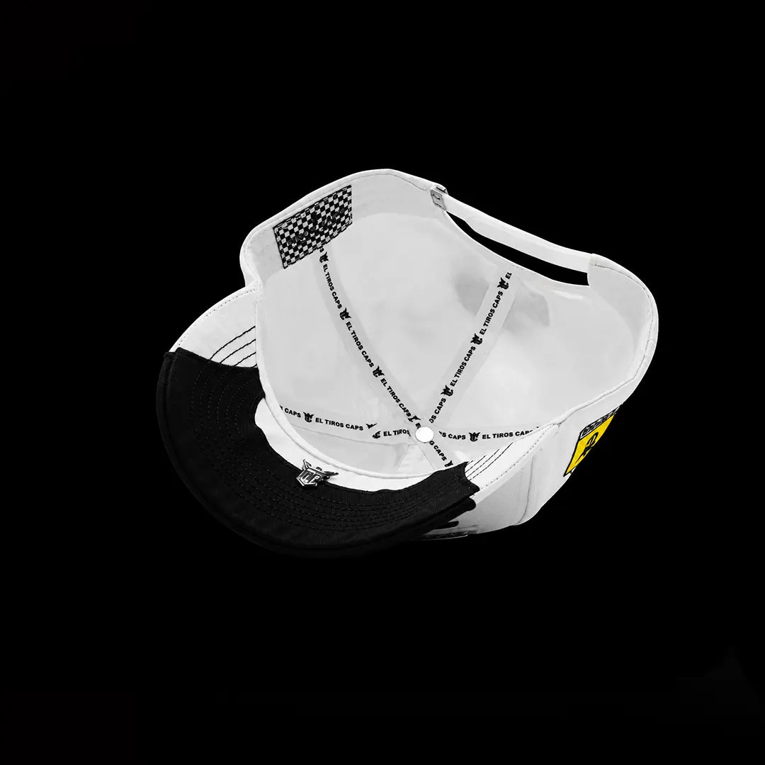 TIROS Racing Cap on white with over all embriodery inner view