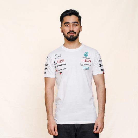 White short-sleeve T-shirt with racing team logos shown on a male model, front facing.