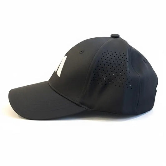 Black cap with perforated design on a white background