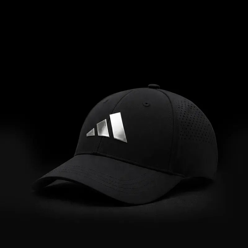 Black cap with Adidas logo on a black background
