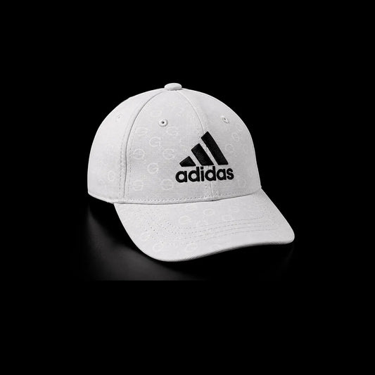 A white Adidas baseball cap with a black embroidered logo on the front, set against a solid black background.