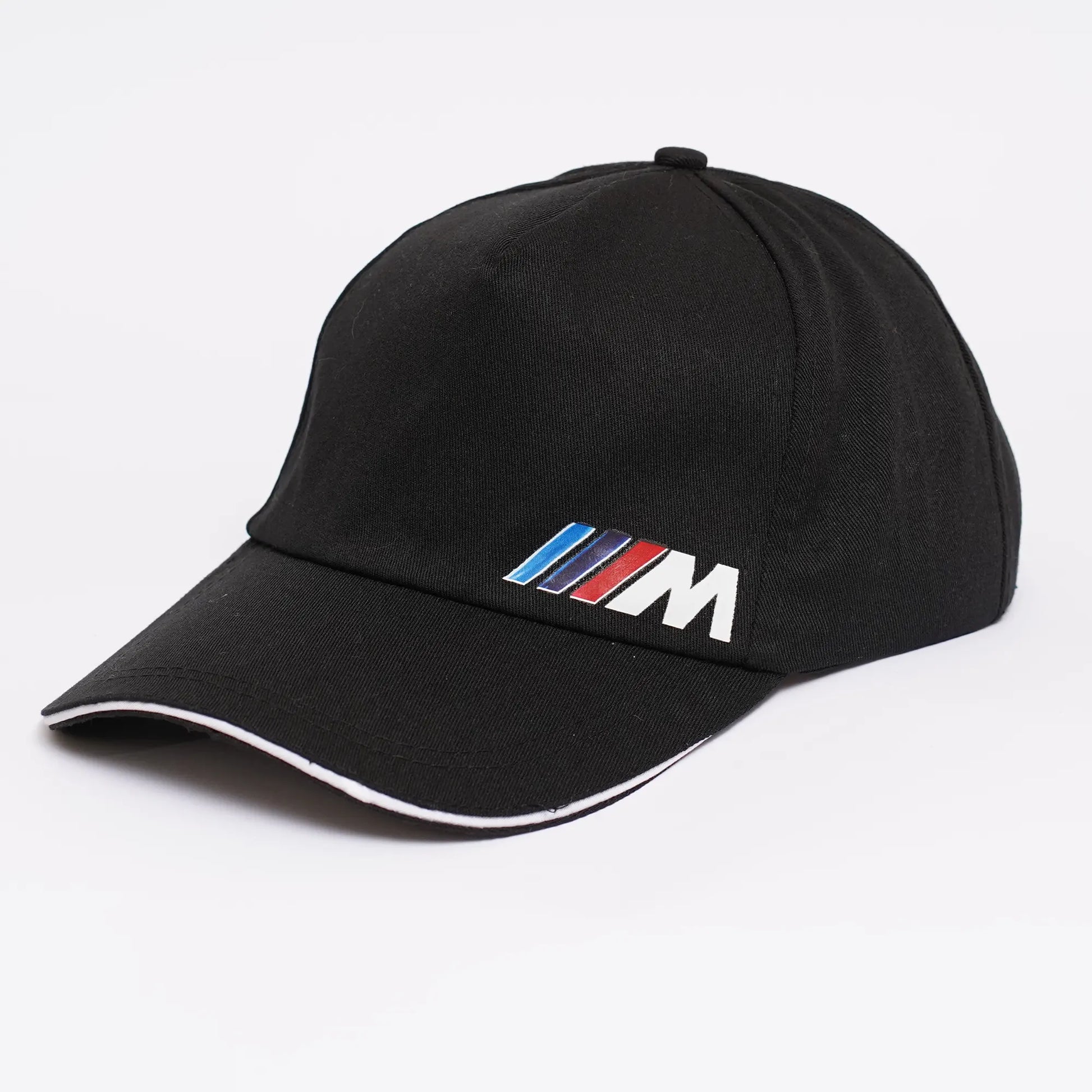 A black cap with the BMW M logo o in white on the front, with a red, blue, and white stripe accent.