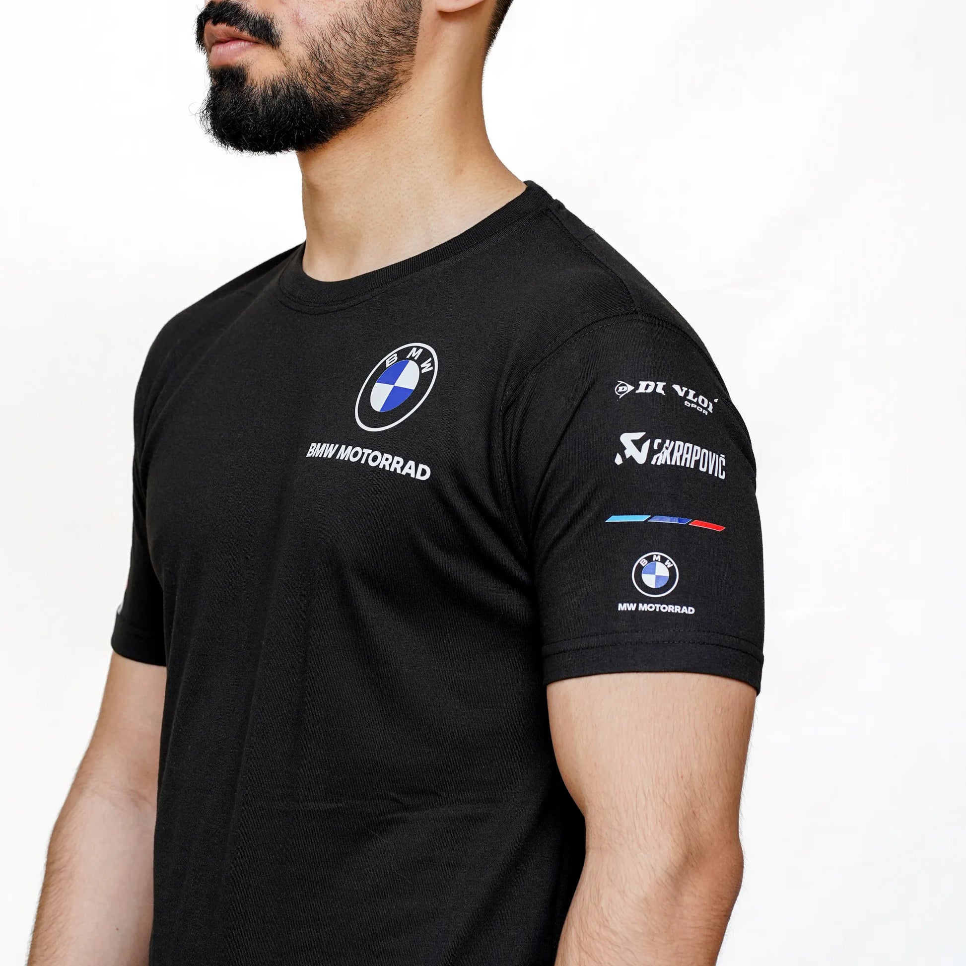 BMW Tshirt side view in black wearing by male and branding on it.