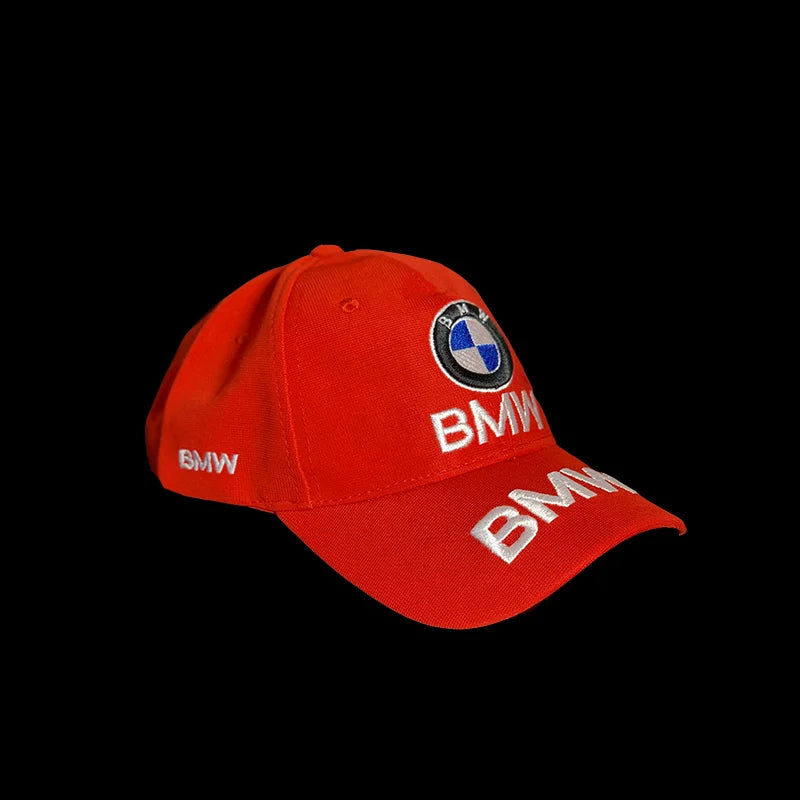Red BMW cap with logo on a black background