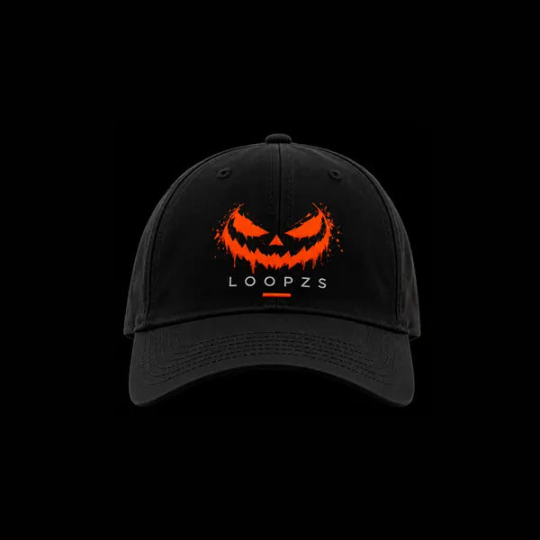 Black baseball cap front view with glowing orange dripping pumpkin face print and Loopzs wordmark