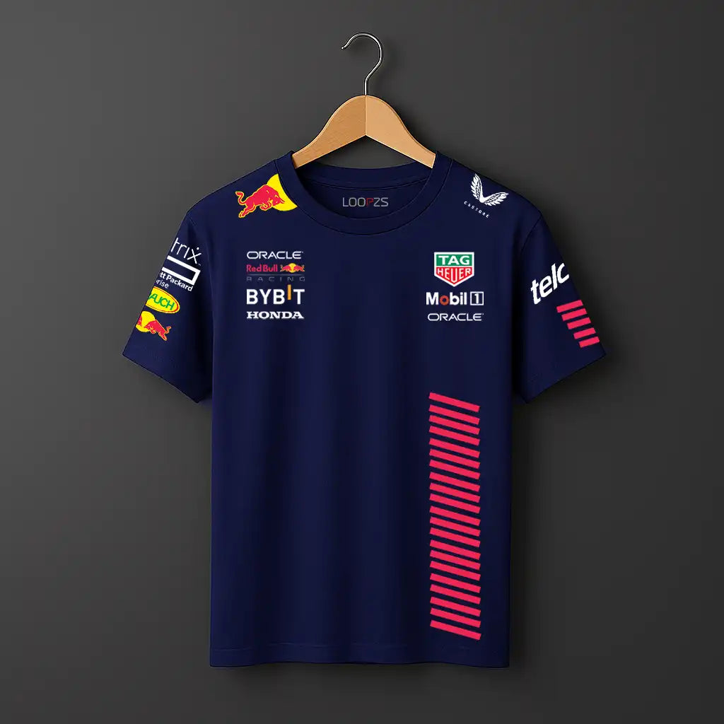 Castore Youth Max Verstappen Red Bull Racing tee with lines and other brandig in navy blue .