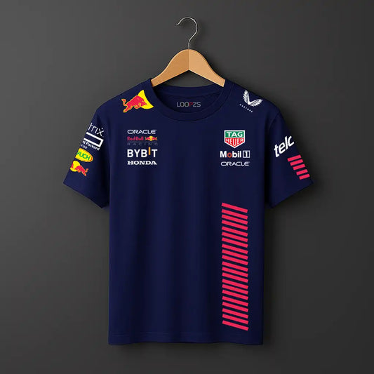 Castore Youth Max Verstappen Red Bull Racing tee with lines and other brandig in navy blue .