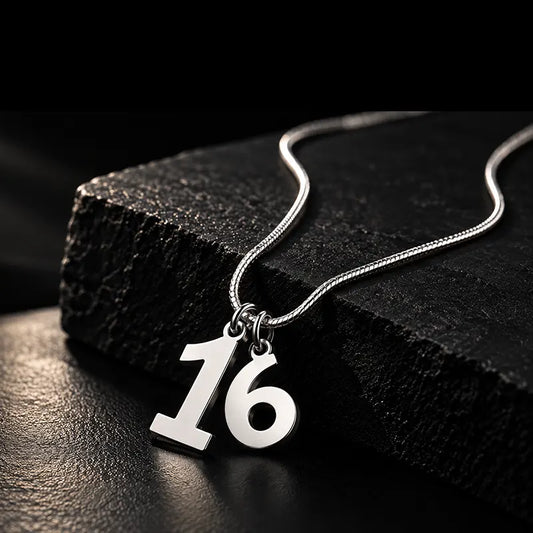 Silver number 16 racing pendant on a chain