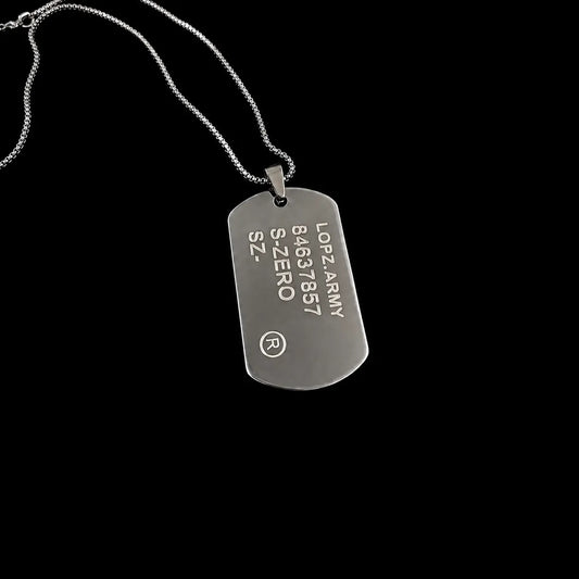 A silver dog tag necklace engraved with 'LOPZ ARMY', 'S-ZERO', and 'SZ-' on a solid black background.