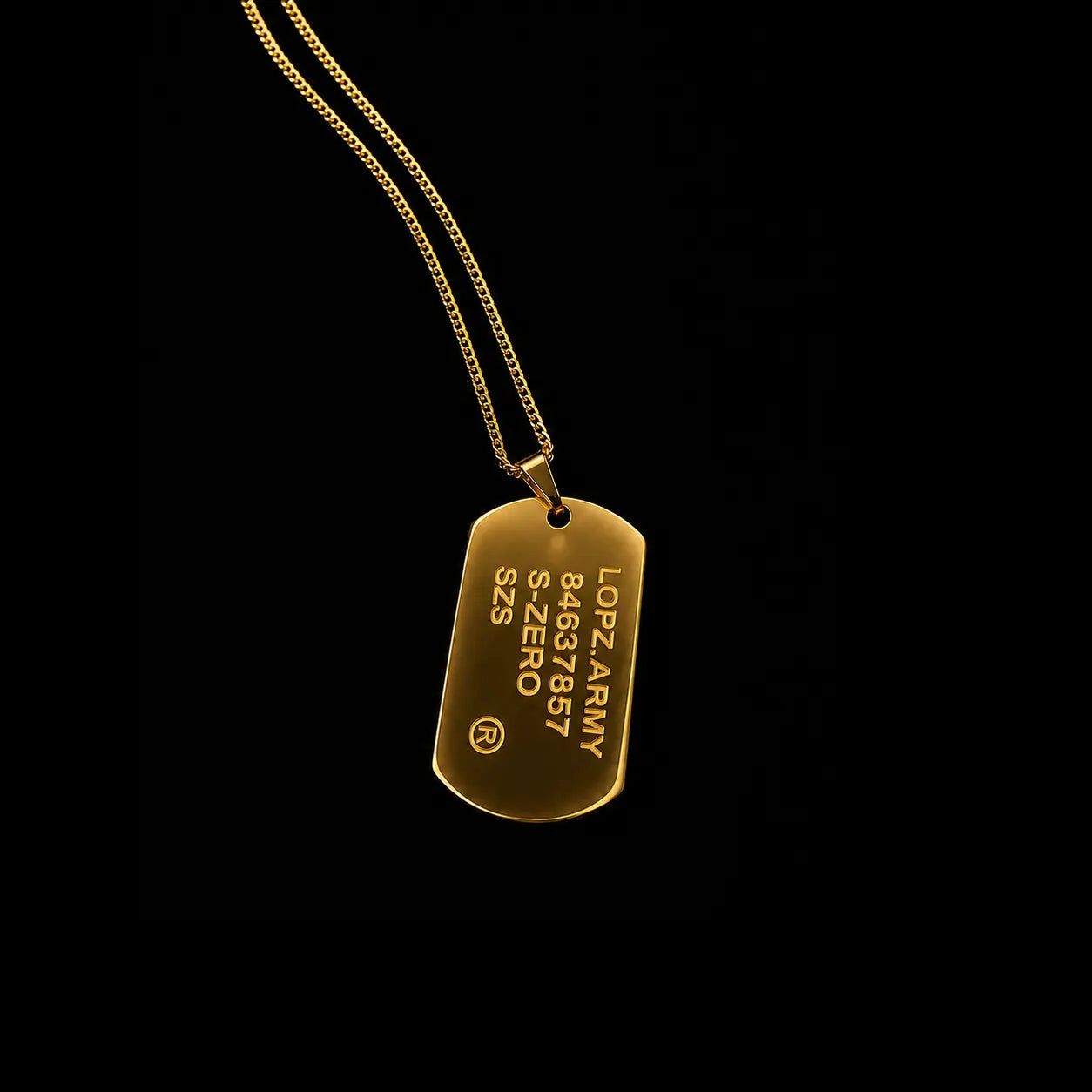 A gold dog tag pendant necklace with a gold chain, displayed against a solid black background. The pendant is engraved with the text 'LOPZ ARMY 84637 857 S-ZERO 913'.