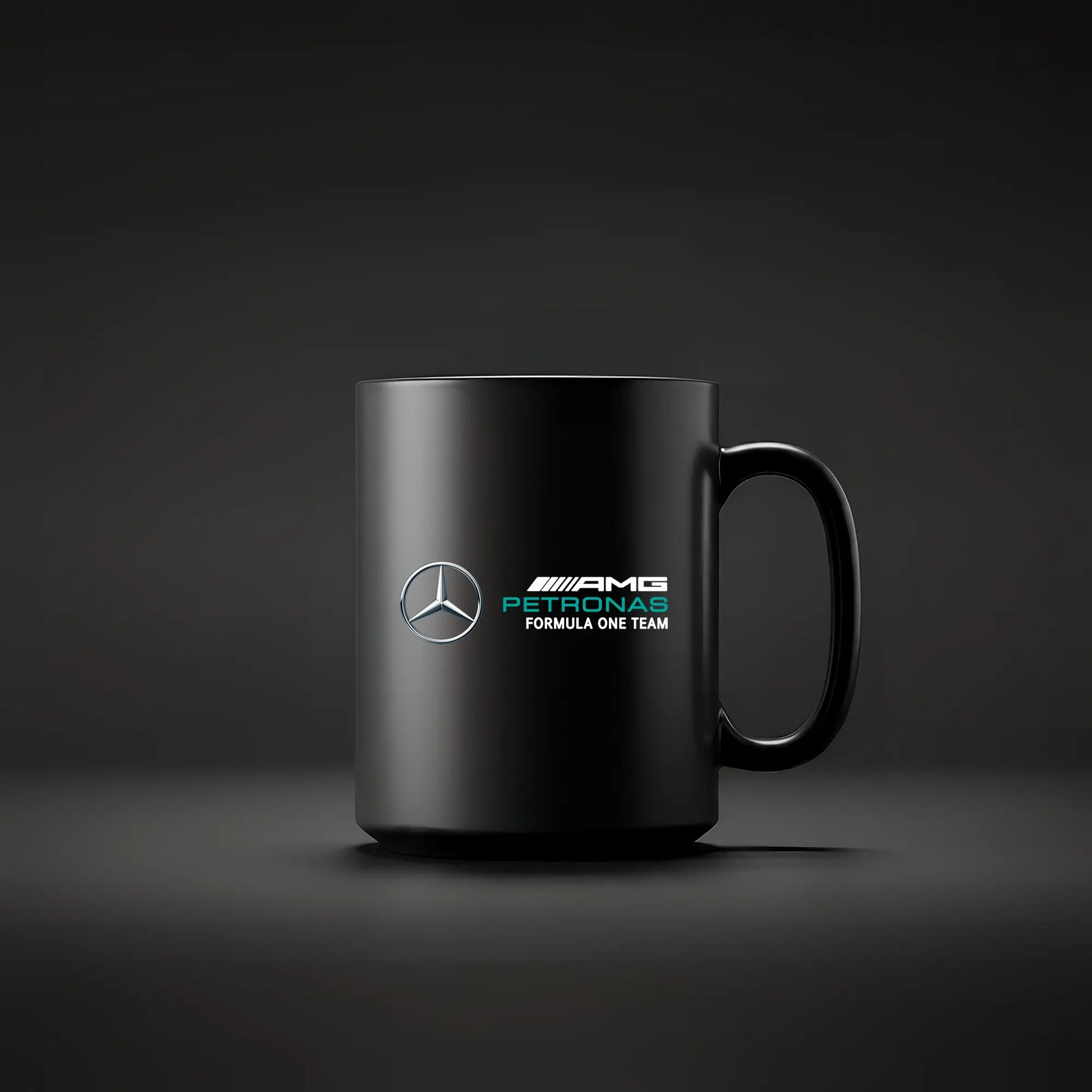 Black mug with Racing Collection AMG F1 logo on a dark background