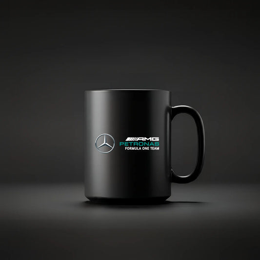 Black mug with Mercedes AMG F1 logo on a dark background