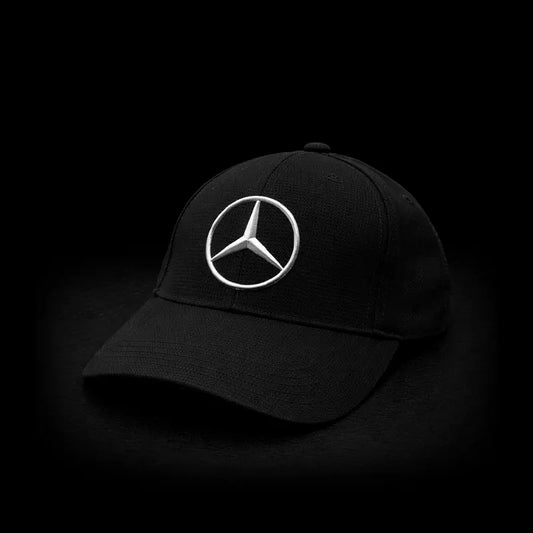 Black cap with Mercedes-Benz logo on a black background