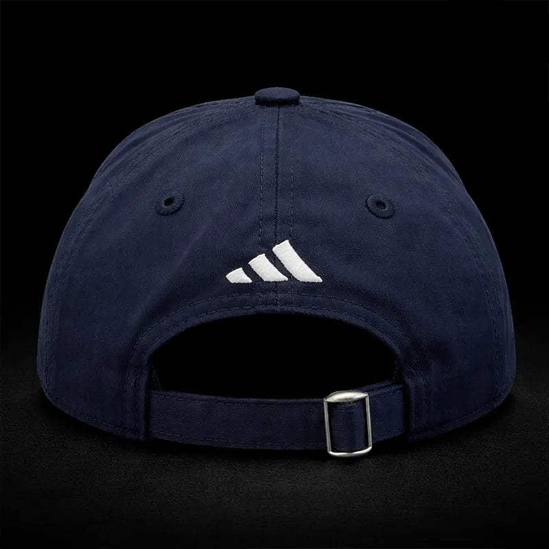 Navy blue cap with Adidas logo on a black background