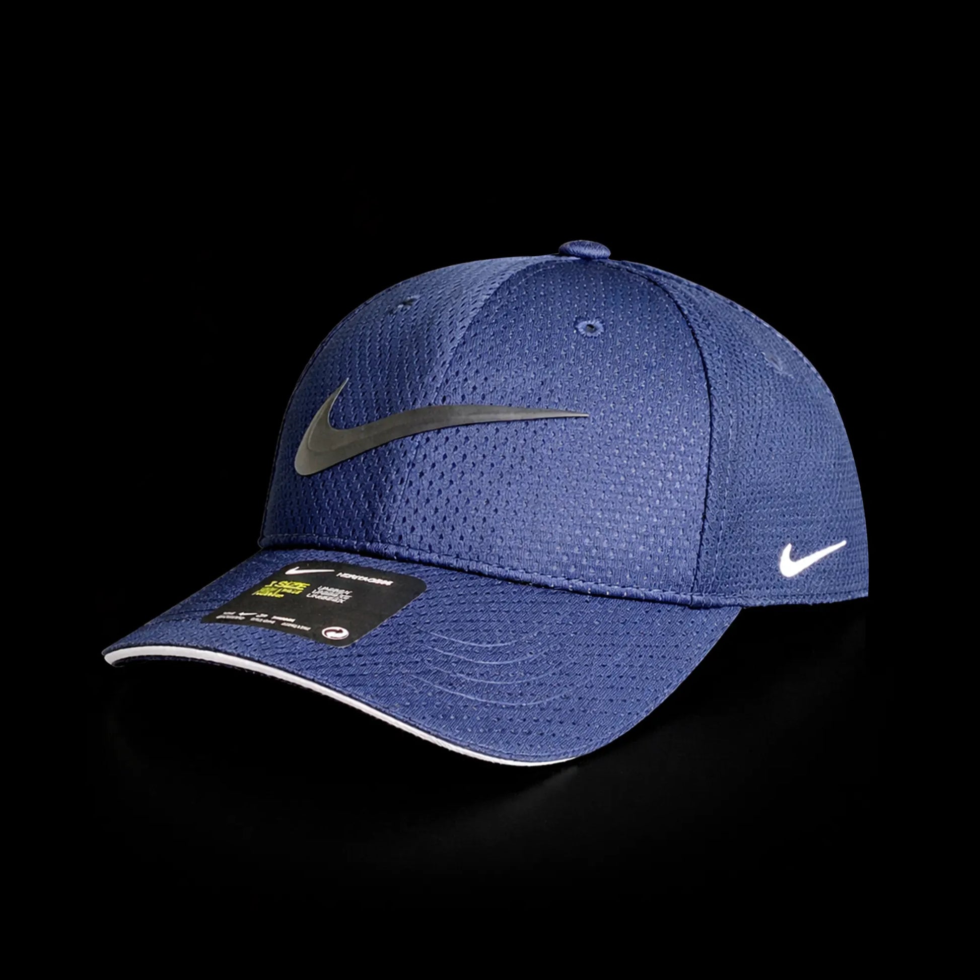 Blue Nike cap with a black swoosh logo on a black background