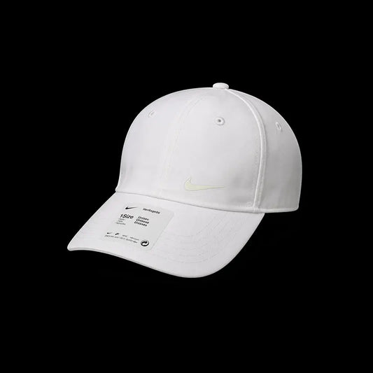 White cap with Nike logo on a black background