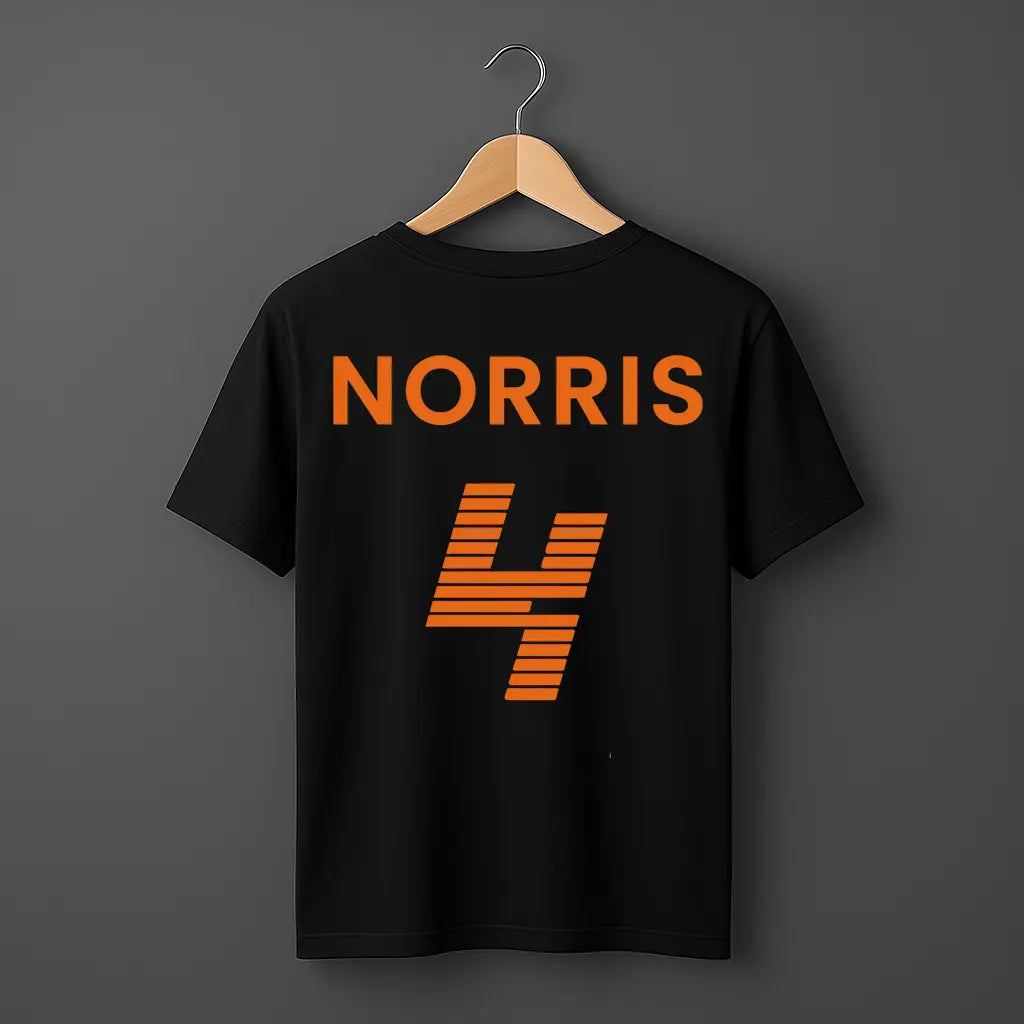 Black t-shirt with 'NORRIS 4' printed in orange on a hanger against a dark background