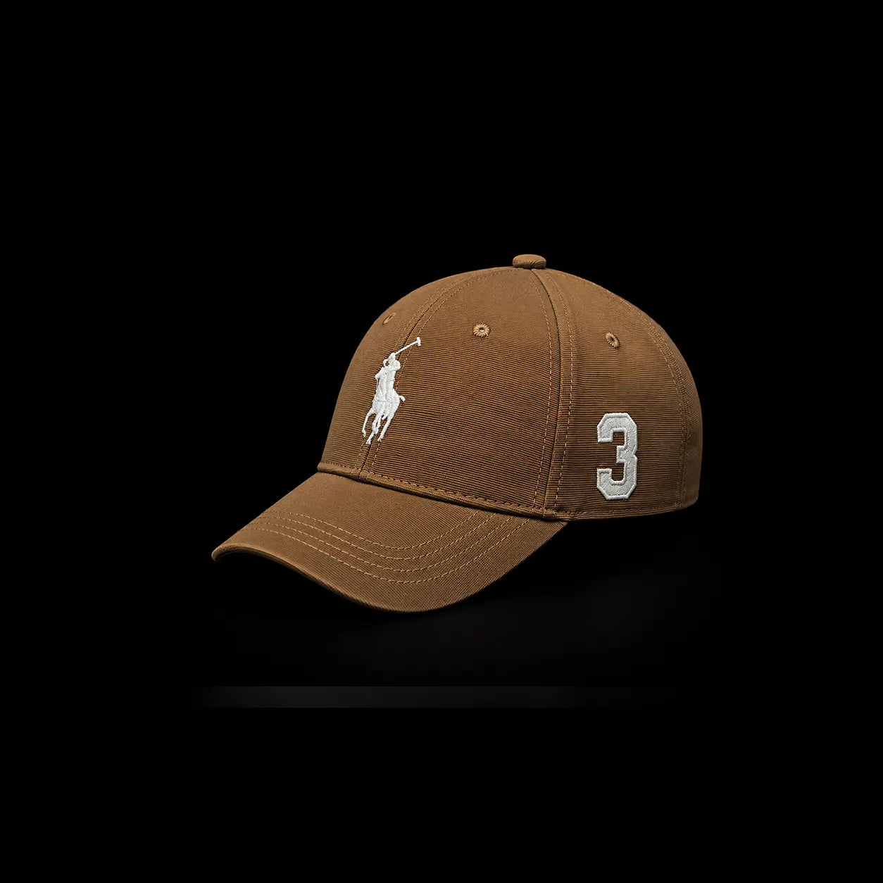 A brown baseball cap featuring the white embroidered Polo Ralph Lauren pony logo on the front and the number 3 on the side, set against a solid black background.