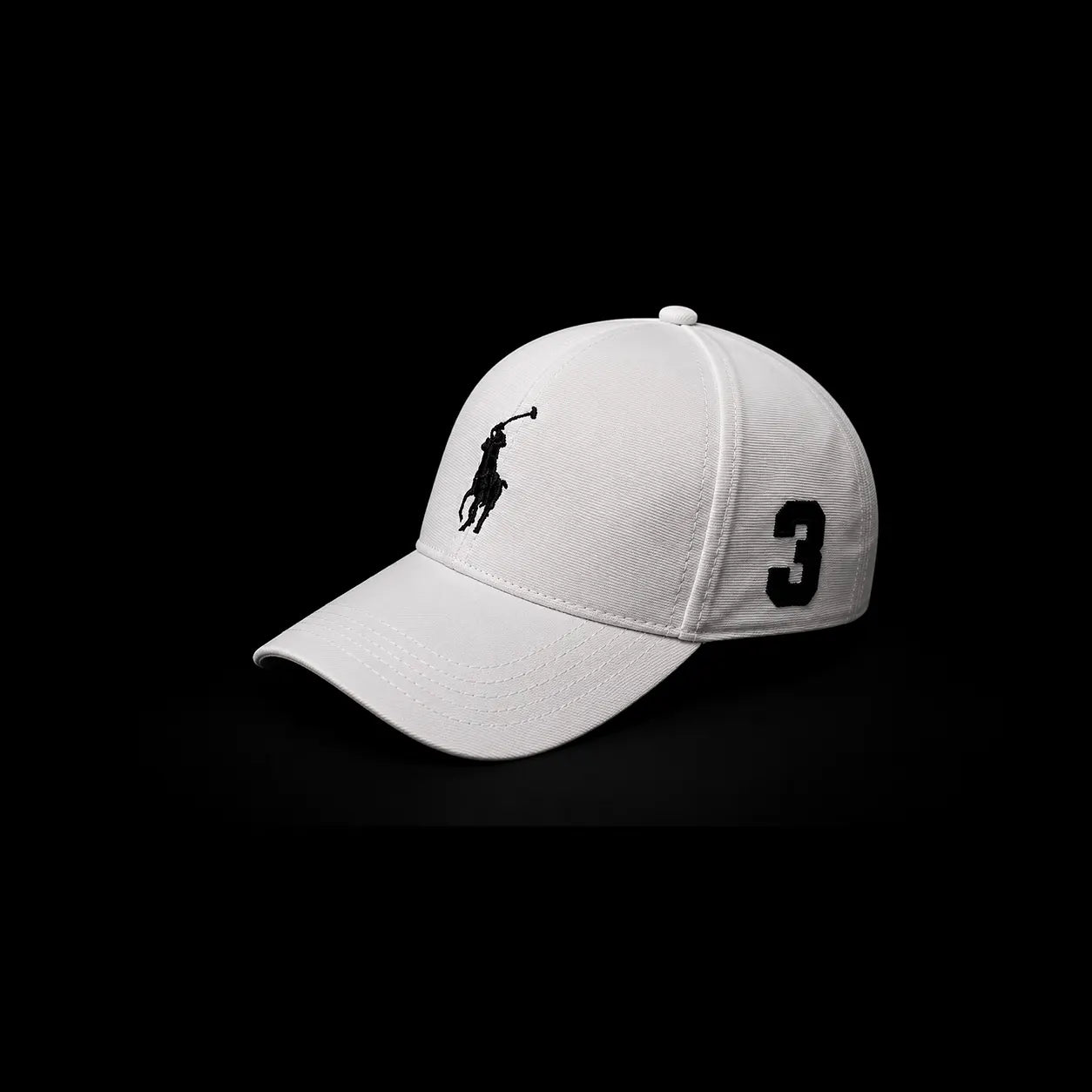A white baseball cap with a black embroidered Polo Ralph Lauren logo on the front and the number 3 on the side, set against a solid black background.