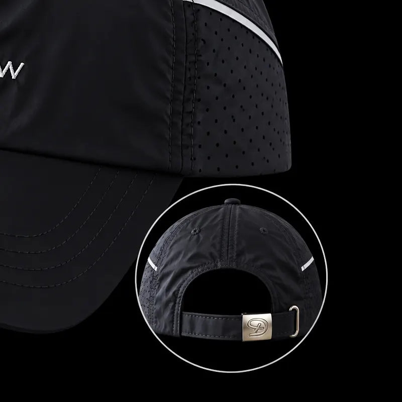 Black athletic cap with reflective white trim and a circular inset showing the adjustable back strap with a silver metal buckle.