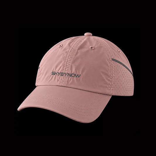 A dusty pink baseball cap with 'SKYEYNOW' embroidered on the front, shown against a solid black background.