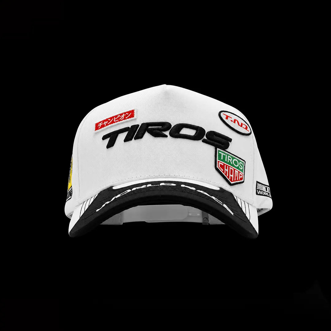 TIROS Racing Cap on white with over all embriodery front view