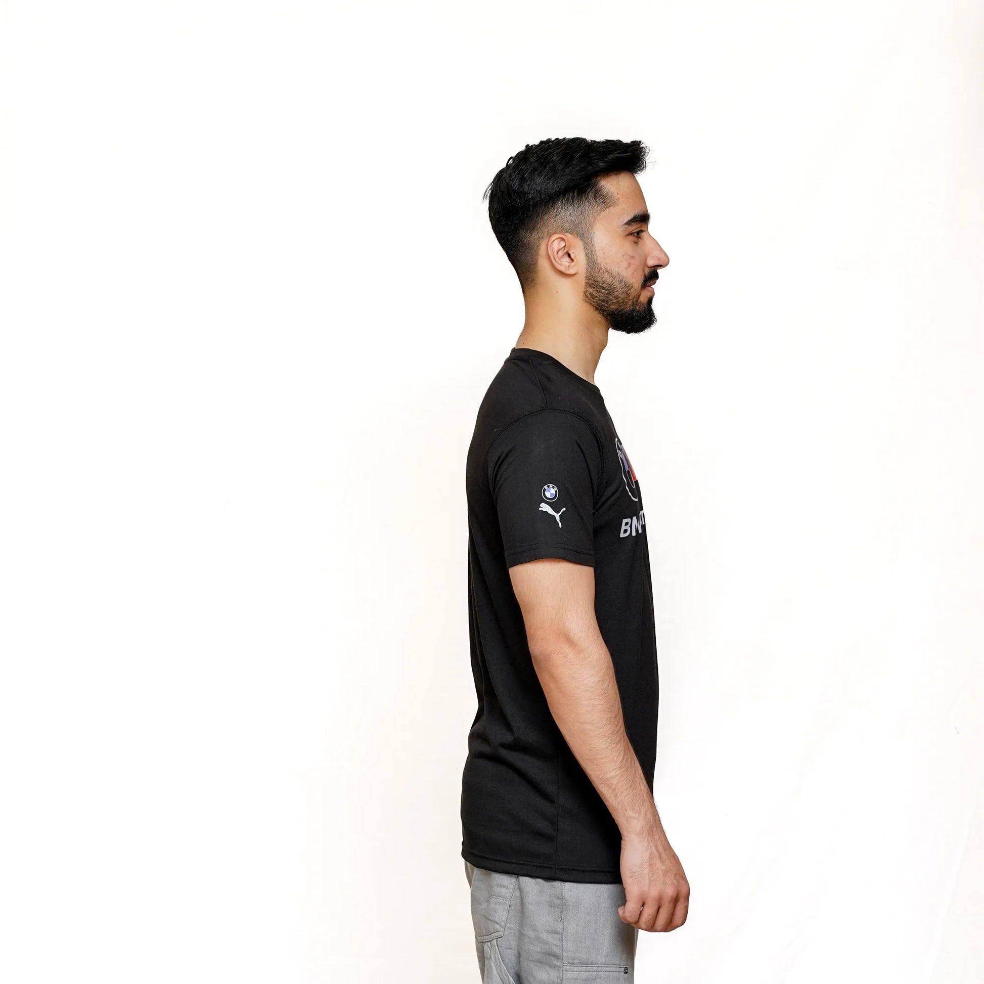 Product image showing the front of a BMW M Motorsport x PUMA men’s tee, regular fit, short sleeves.