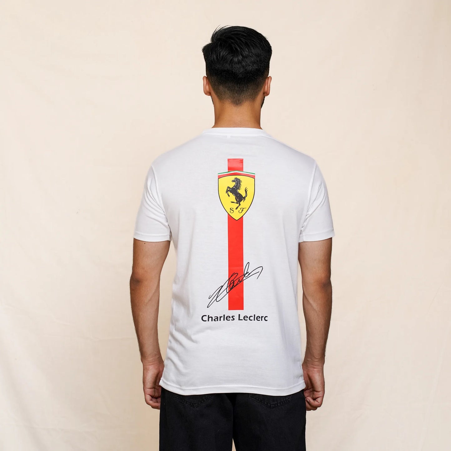 Ferrari logo printed on back of white cotton tee for F1 enthusiasts.
