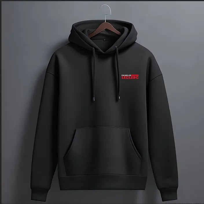 Black oversized racing hoodie front view with small red lettering print on the chest and kangaroo pocket