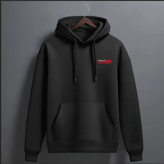 Black oversized racing hoodie front view with small red lettering print on the chest and kangaroo pocket