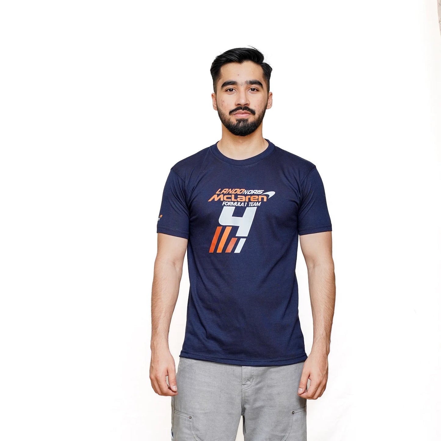 Navy blue T-shirt with McLaren Formula 1 Team graphic and large number 4 design.