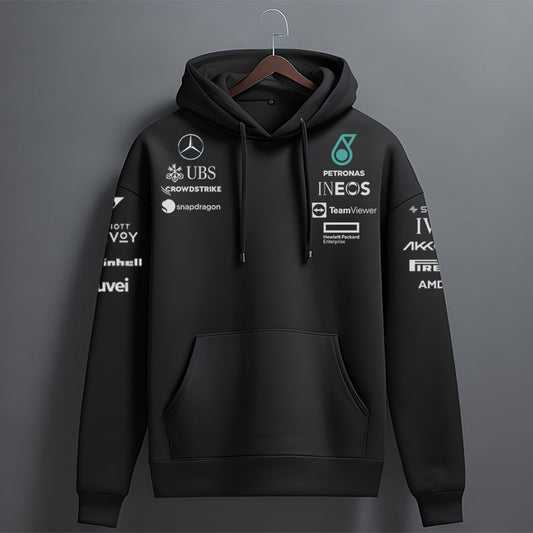 Black hoodie with various logos on a gray background