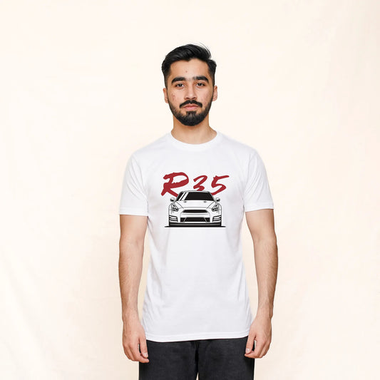 A man wearing a white crew neck T-shirt with a graphic print of a Nissan R35 and the text 'R35' on the front.
